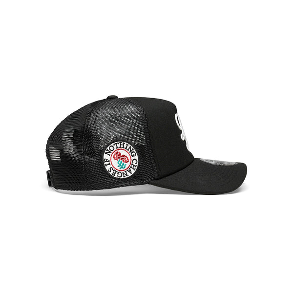 "NOTHING CHANGES" NEW ERA 9FORTY TRUCKER CAP [BLACK]